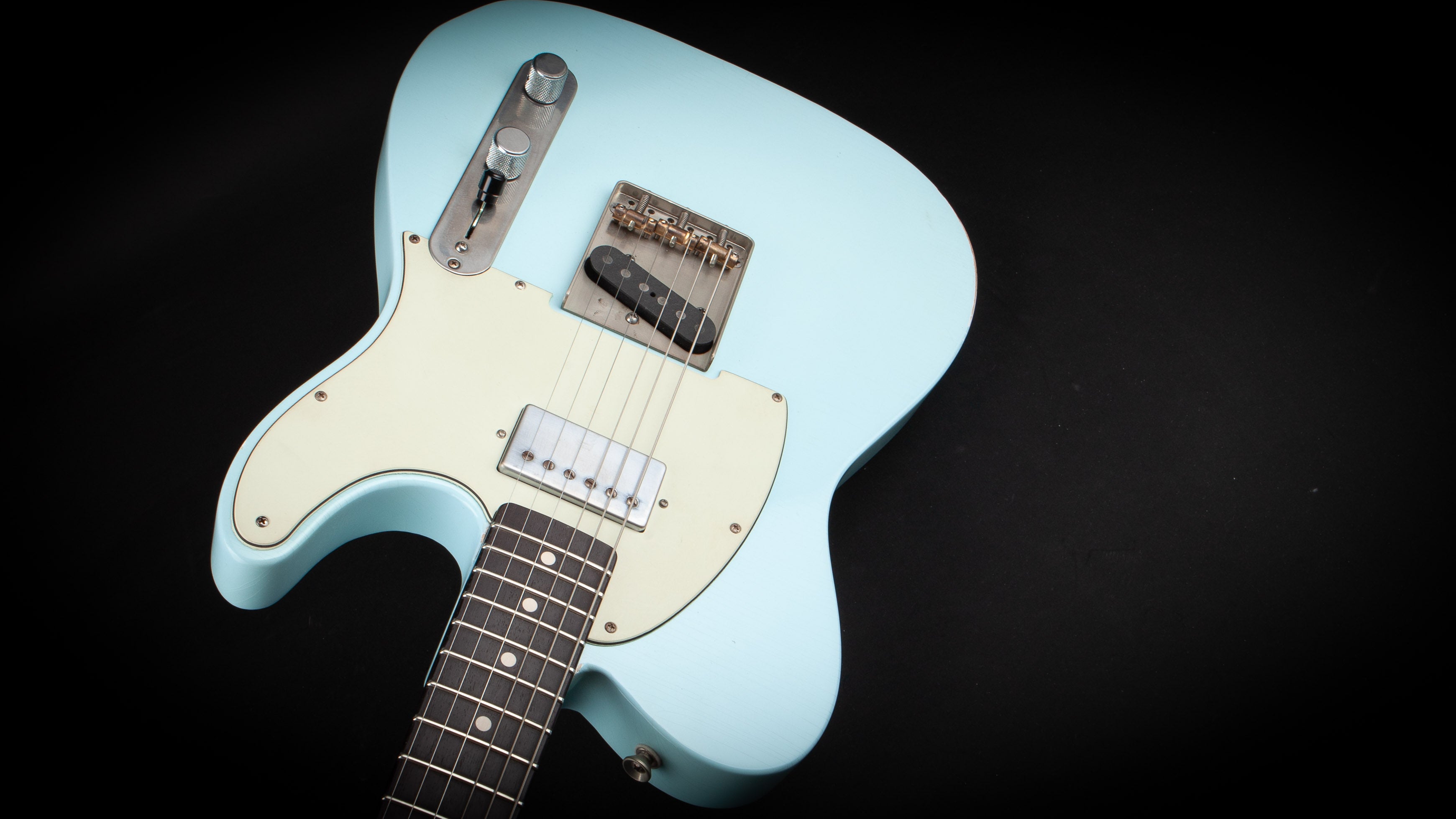 Smitty Guitars: T Style Sonic Blue with Mastergrade Roasted Flame Maple Neck